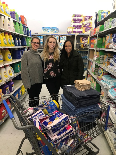 Physician assistant students Ashley Tejeda, Brittany Dingler and Alexandra Podesny collecting items for Hub of Hope